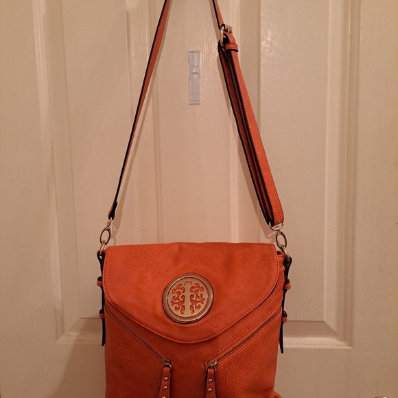 Orange crossbody purse. Took tags off but never wore it. - Picture 7 of 8